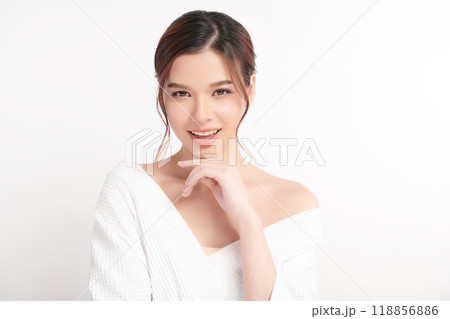 Beautiful young asian woman with clean fresh skin on white background, Face care, Facial treatment, Cosmetology, beauty and spa, Asian women portrait. Beautiful young asian woman with clean fresh skin on white background, Face care, Facial treatment, Cosmetology, beauty and spa, Asian women portrait. 118856886