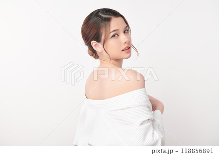 Beautiful young asian woman with clean fresh skin on white background, Face care, Facial treatment, Cosmetology, beauty and spa, Asian women portrait. Beautiful young asian woman with clean fresh skin on white background, Face care, Facial treatment, Cosmetology, beauty and spa, Asian women portrait. 118856891