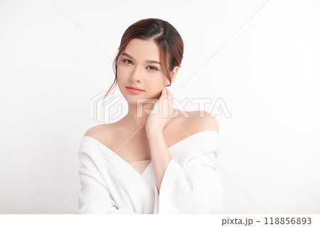 Beautiful young asian woman with clean fresh skin on white background, Face care, Facial treatment, Cosmetology, beauty and spa, Asian women portrait. Beautiful young asian woman with clean fresh skin on white background, Face care, Facial treatment, Cosmetology, beauty and spa, Asian women portrait. 118856893