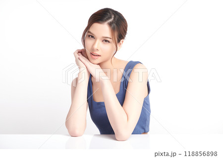 Beautiful young asian woman with clean fresh skin on white background, Face care, Facial treatment, Cosmetology, beauty and spa, Asian women portrait. Beautiful young asian woman with clean fresh skin on white background, Face care, Facial treatment, Cosmetology, beauty and spa, Asian women portrait. 118856898