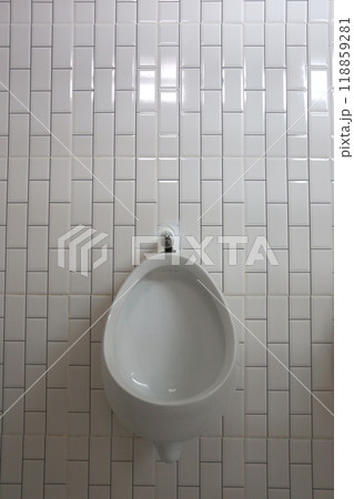 White urinals in the men's bathroom of interior decoration. White urinals in the men's bathroom of interior decoration. 118859281