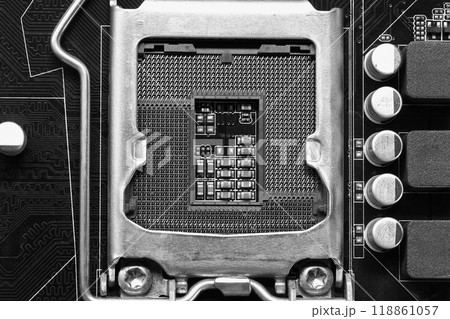Blank CPU socket on mainboard background. 118861057