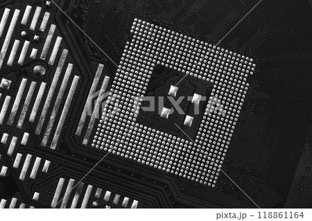 Old black motherboard of computer equipment focusing on CPU slot background, Technology background. 118861164