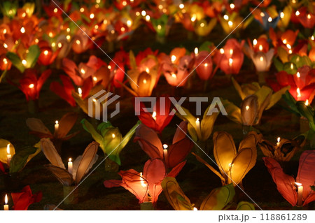 Candles are lit in colorful lanterns at the Loi Krathong festival. Candles are lit in colorful lanterns at the Loi Krathong festival. 118861289