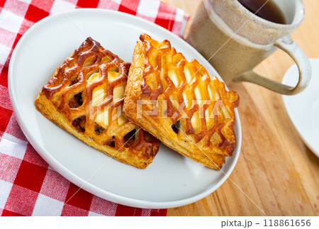 Image of fresh puff cakes with goat cheese at plate 118861656