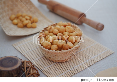 a traditional cake from Indonesia called kue sus filled with cream puffs 118863466