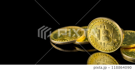 Bitcoin on dark background, Close up golden bitcoin a digital currency, operates on a decentralized system with transactions recorded and new units created without central authority Bitcoin on dark background, Close up golden bitcoin a digital currency, operates on a decentralized system with transactions recorded and new units created without central authority 118864090