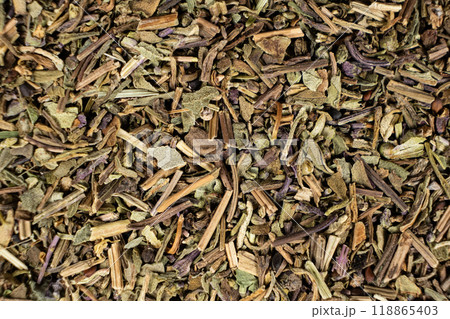 Dry basil spice seasoning macro texture top view Dry basil spice seasoning macro texture top view 118865403