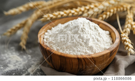 Wooden bowl with wheat flour 118866086