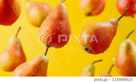 Ripe pears in fall on a yellow background 118866623