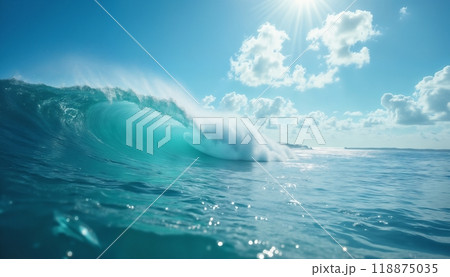 a large and beautiful ocean wave, against a blue sky background, a paradise seascape 118875035