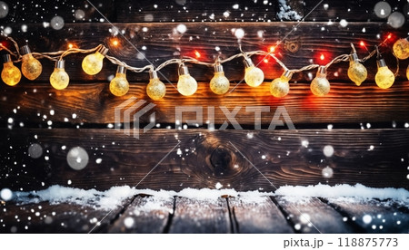 Christmas decorations and gifts and garland on an old wooden background for new year celebrations, winter fairy tale 118875773