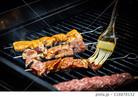 Grilled Kebab From Fresh Meat Pork Cooking On Metal Skewer Outdoors grill steak Grilled Kebab From Fresh Meat Pork Cooking On Metal Skewer Outdoors grill steak 118878132