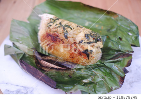 Grilled rice served on a wooden table. 118878249