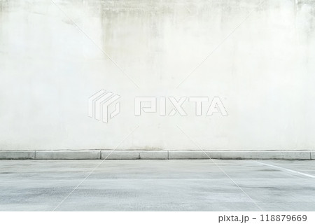 Empty urban area with a plain wall and clean pavement during daytime 118879669