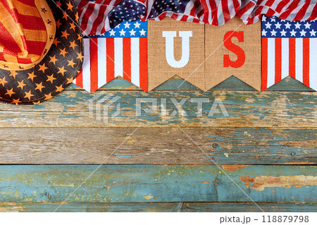 Inscription of US on holiday banner is symbolic of America Inscription of US on holiday banner is symbolic of America 118879798