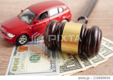 Car accident lawsuit and insurance, Judge hammer and money with car model. 118880650