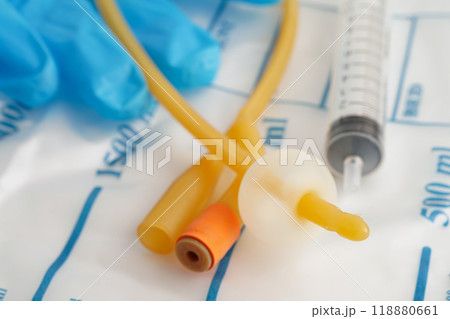 Foley catheter and urine drainage bag collect urine for disability or patient in hospital. 118880661