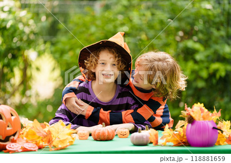 Family decorating home. Halloween arts and crafts. 118881659