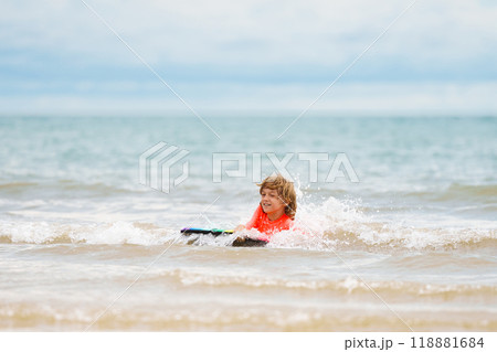 Kids playing on beach. Children play at sea. Kids playing on beach. Children play at sea. 118881684