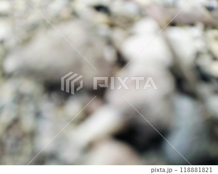 Close up of pebbles and rocks with blurry background, Natural stones background, wallpaper out of focus. Close up of pebbles and rocks with blurry background, Natural stones background, wallpaper out of focus. 118881821
