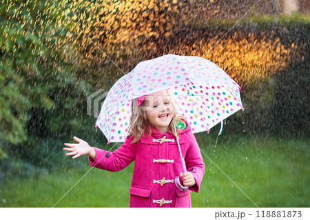 Little girl with umbrella in the rain Little girl with umbrella in the rain 118881873