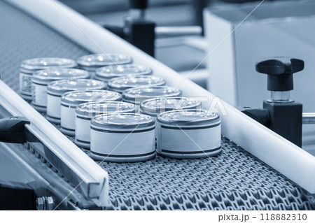 The high technology material handling process in canned food production by roller conveyor. 118882310