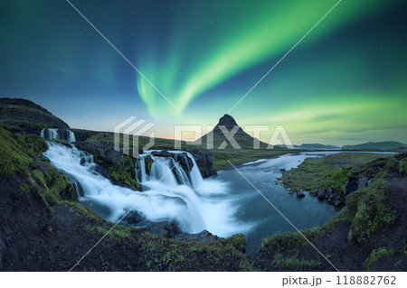 Panoramic view on Kirkjufellsfoss waterfall under incredible sky 118882762