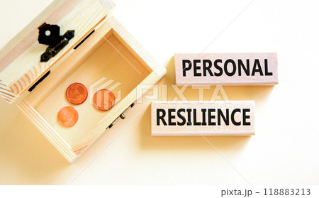 Personal resilience symbol. Concept word Personal resilience on wooden blocks. Beautiful white background. Wooden chest with coins. Business psychological personal resilience concept. Copy space. 118883213