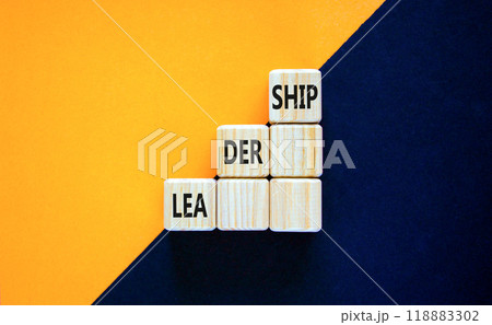Leadership symbol. Concept word Leadership on beautiful wooden cubes. Beautiful orange black background. Business leadership concept. Copy space. 118883302