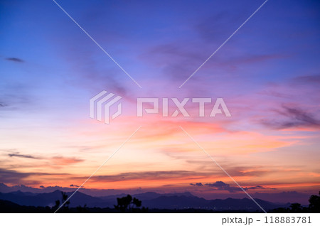 Evening time of panorama mountain under dramatic twilight sky and cloud. Nightfall Silhouette mountain on sunset. 118883781