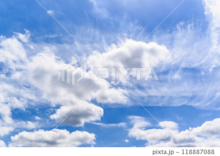 White clouds in a bright blue sky. The beauty of the nature White clouds in a bright blue sky. The beauty of the nature 118887088