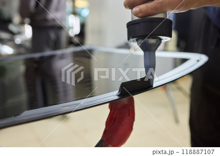 Installing windshield on a car with automotive design 118887107