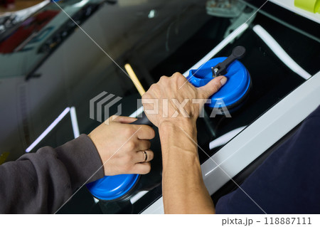 Installing windshield on a car with automotive design Installing windshield on a car with automotive design 118887111