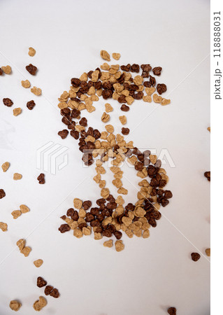 Close up of a dollar sign made from cereals Close up of a dollar sign made from cereals 118888031