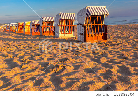 Row of Strandkorb Beach Chairs at Sunset, Baltic Coast, Poland 118888304