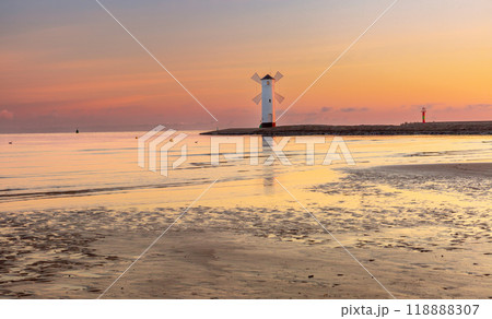 Stawa Mlyny lighthouse at sunrise, Swinoujscie, Poland 118888307