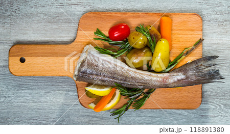 Hake by rustically, frying and served with boiled potatoes, carrots and greens Hake by rustically, frying and served with boiled potatoes, carrots and greens 118891380