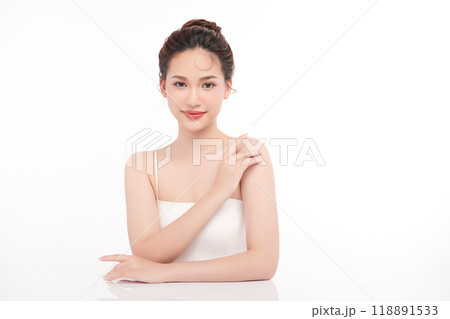 Beautiful young asian woman with clean fresh skin on white background, Face care, Facial treatment, Cosmetology, beauty and spa, Asian women portrait. Beautiful young asian woman with clean fresh skin on white background, Face care, Facial treatment, Cosmetology, beauty and spa, Asian women portrait. 118891533