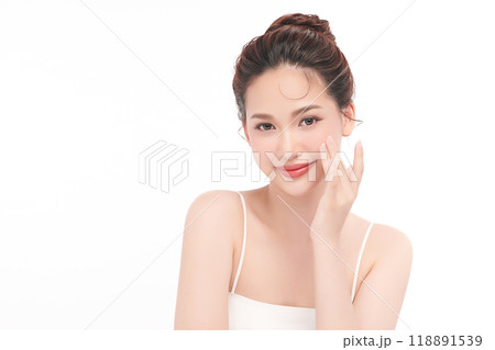 Beautiful young asian woman with clean fresh skin on white background, Face care, Facial treatment, Cosmetology, beauty and spa, Asian women portrait. Beautiful young asian woman with clean fresh skin on white background, Face care, Facial treatment, Cosmetology, beauty and spa, Asian women portrait. 118891539