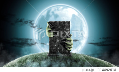 A tombstone is being held by two witch hand in front of a full moon. Scene is scary and creepy. The hand appearing to be a evil, satan, zombie or a monster hand A tombstone is being held by two witch hand in front of a full moon. Scene is scary and creepy. The hand appearing to be a evil, satan, zombie or a monster hand 118892618