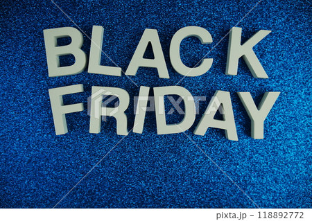 Black Friday alphabet letters on blue glitter background 118892772