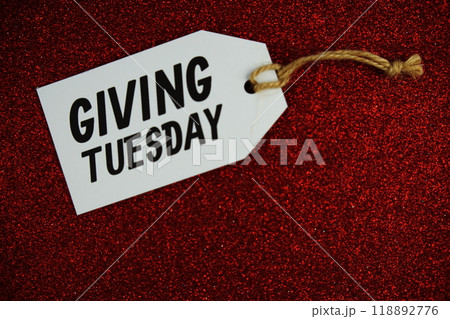Giving Tuesday text message on paper tag with space for copy background 118892776