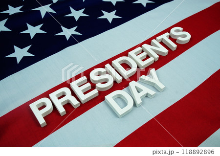 Happy President's Day alphabet letters with USA flag background Happy President's Day alphabet letters with USA flag background 118892896