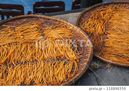 Dried fish sticks on market in Vietnam in Asia 118898350