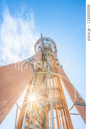 The distinctive Hamstejn lookout tower stands tall in Bohemian Paradise, featuring a spiral staircase and a unique steel tube design. Visitors can admire sweeping views of the landscape. The distinctive Hamstejn lookout tower stands tall in Bohemian Paradise, featuring a spiral staircase and a unique steel tube design. Visitors can admire sweeping views of the landscape. 118898806