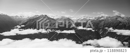 Majestic alpine panorama with glacier mountain of Grossvenediger. The main peak of the Venediger Group in Hohe Tauern mountain range. Austrian Alps, Austria. Black and white image. 118898823