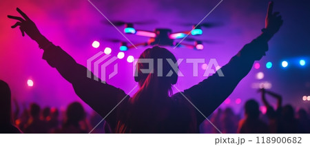 Person enjoying a drone show at night Person enjoying a drone show at night 118900682