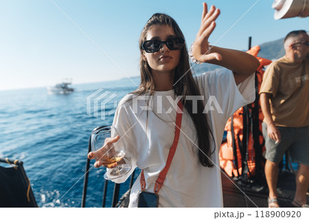 A FunFilled Day at Sea Enjoying the Sun, Having Fun with Friends, and Seeking Adventure A FunFilled Day at Sea Enjoying the Sun, Having Fun with Friends, and Seeking Adventure 118900920