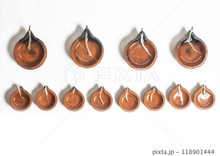 Set of diwali diya lamps isolated on white background. Set of diwali diya lamps isolated on white background. 118901444